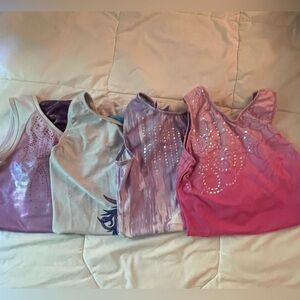 Adult x-small Women’s gymnastics leotards, set of 4.
